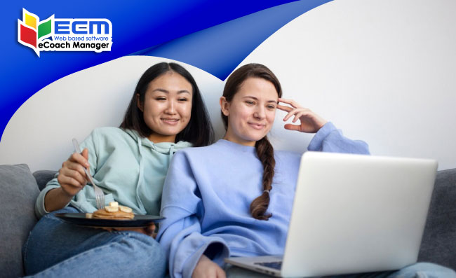 friends watching a video on laptop, group travels, UK influencer travel trends